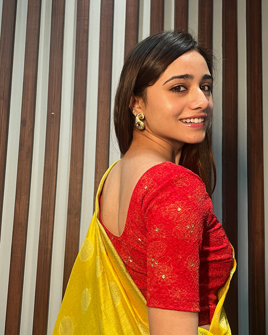 Model pairing the blouse with a festive saree for occasions