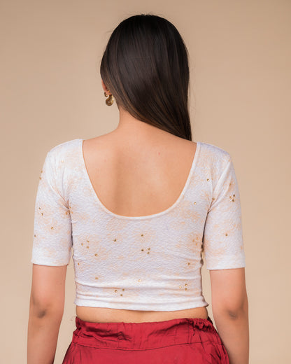 Rear view showcasing the back design texture and embellishments