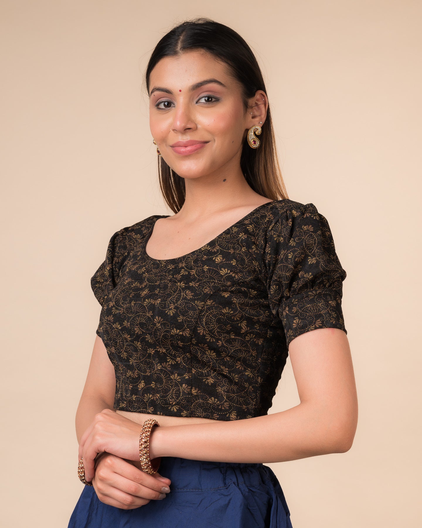 Side profile highlighting the fit, sleeve length, and back buckle feature