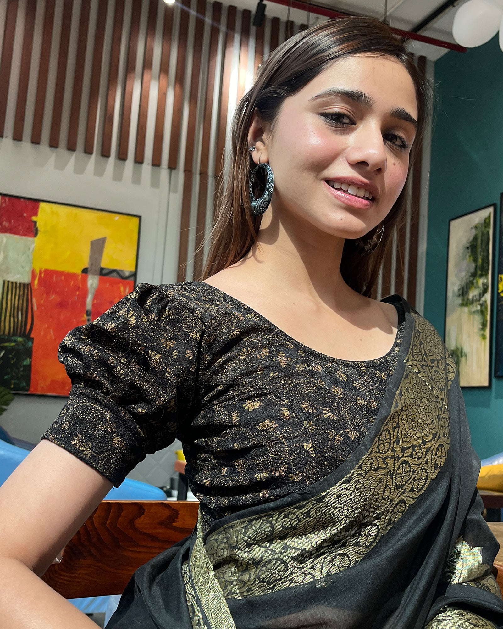 Model pairing the blouse with a saree for a refined festive look