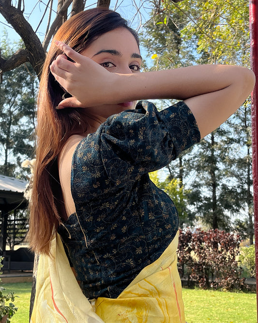 Model pairing the blouse with a saree for a refined festive look