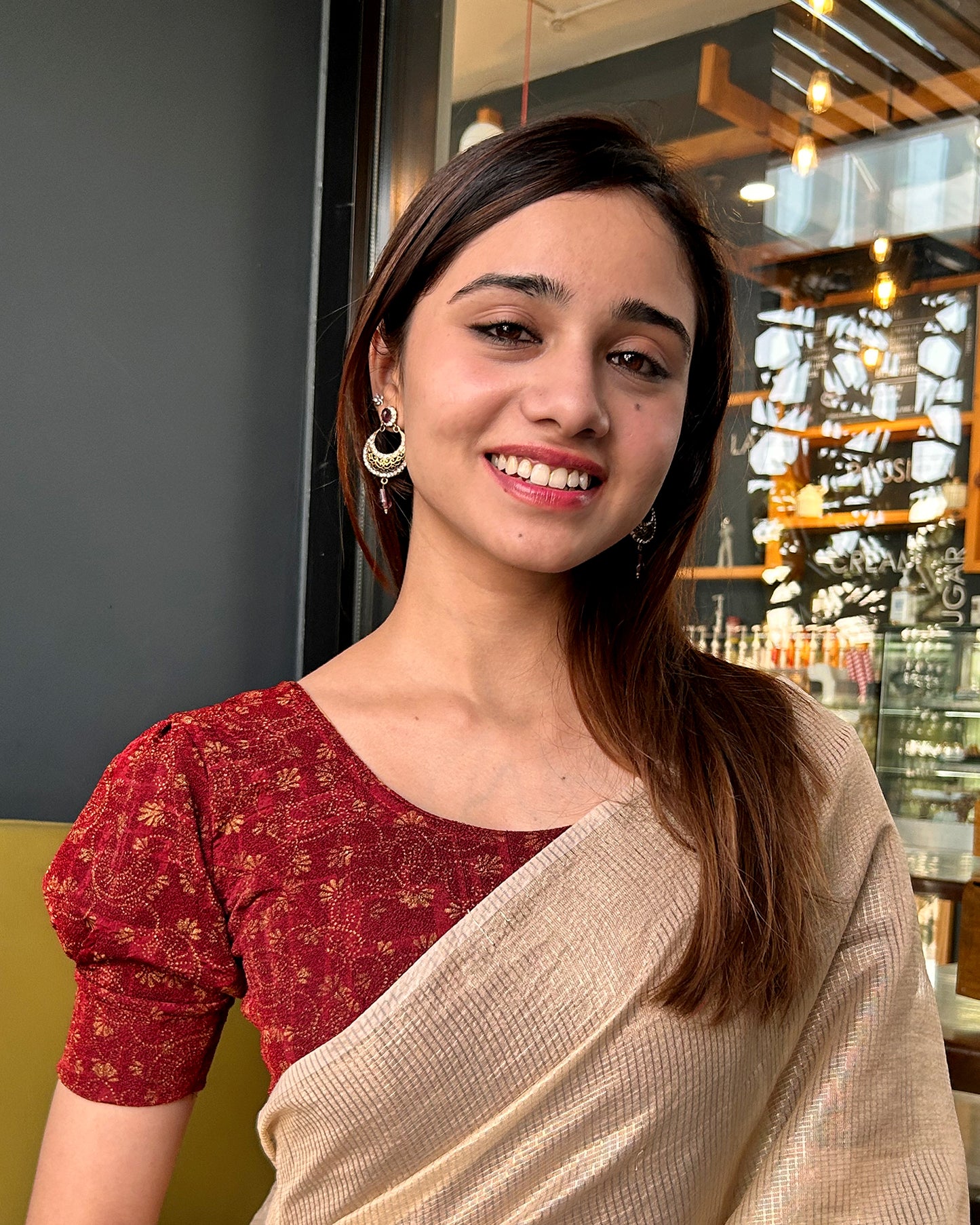 Model pairing the blouse with a saree for a refined festive look