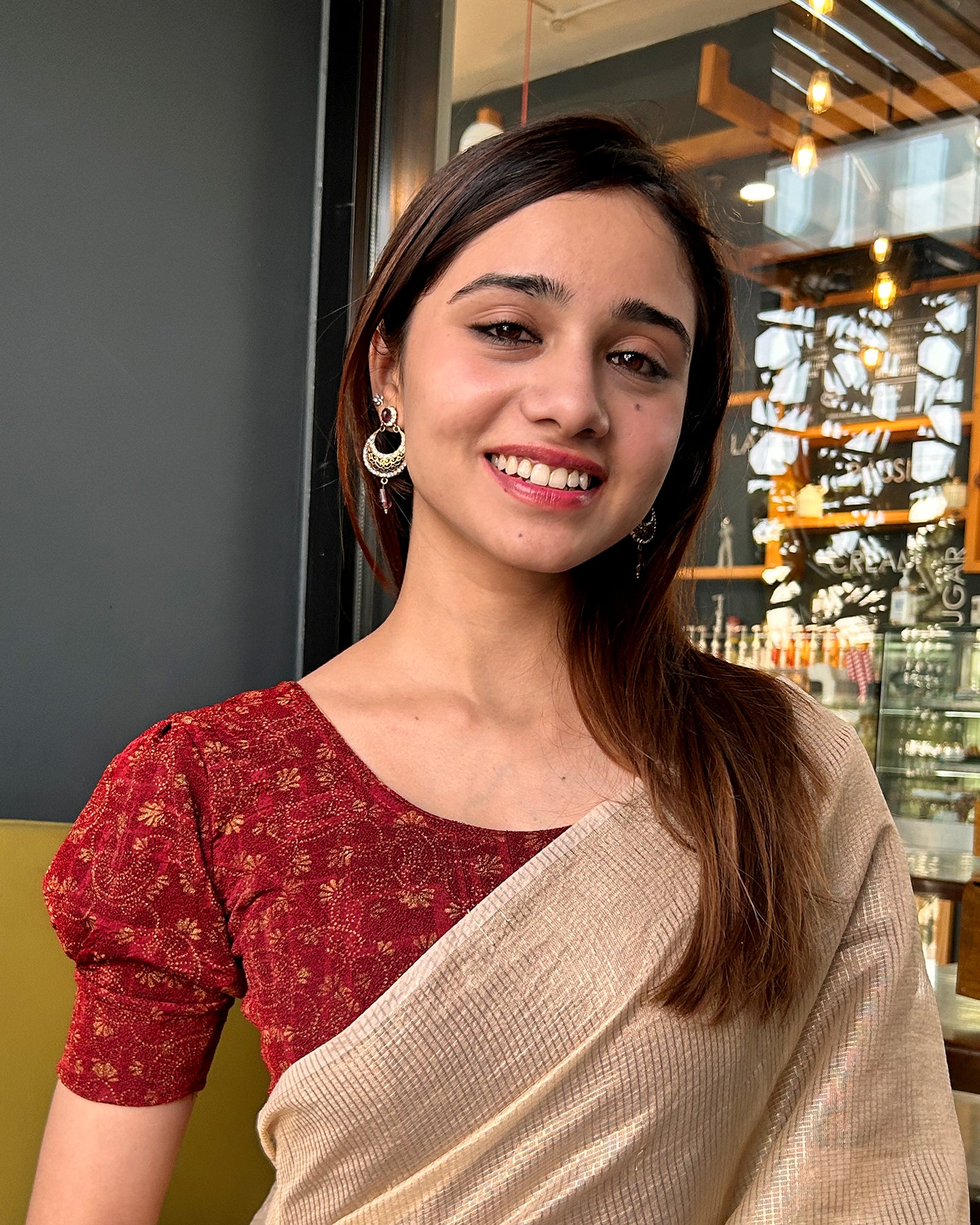 Model pairing the blouse with a saree for a refined festive look