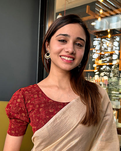 Model pairing the blouse with a saree for a refined festive look