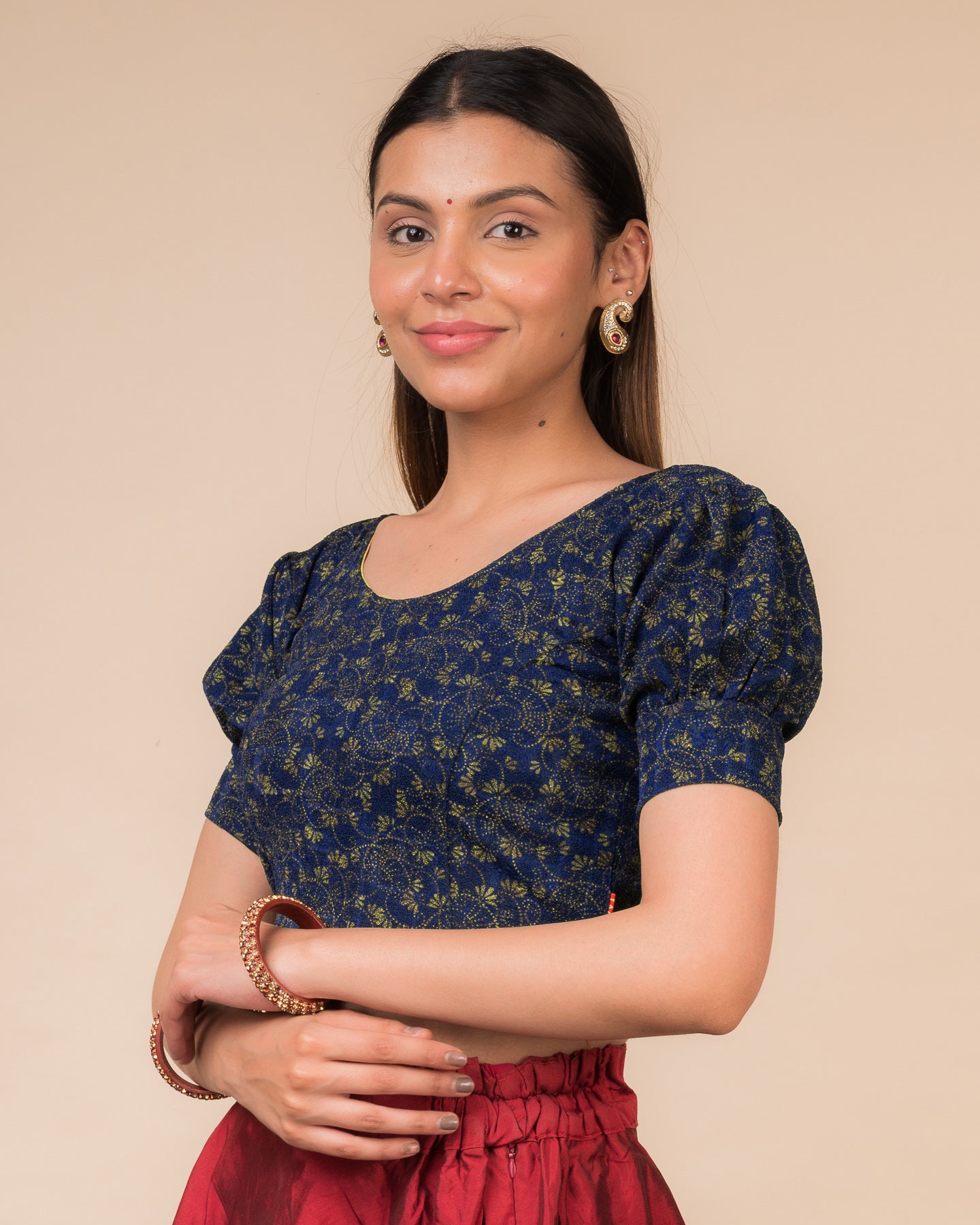 Side profile highlighting the fit, sleeve length, and back buckle feature