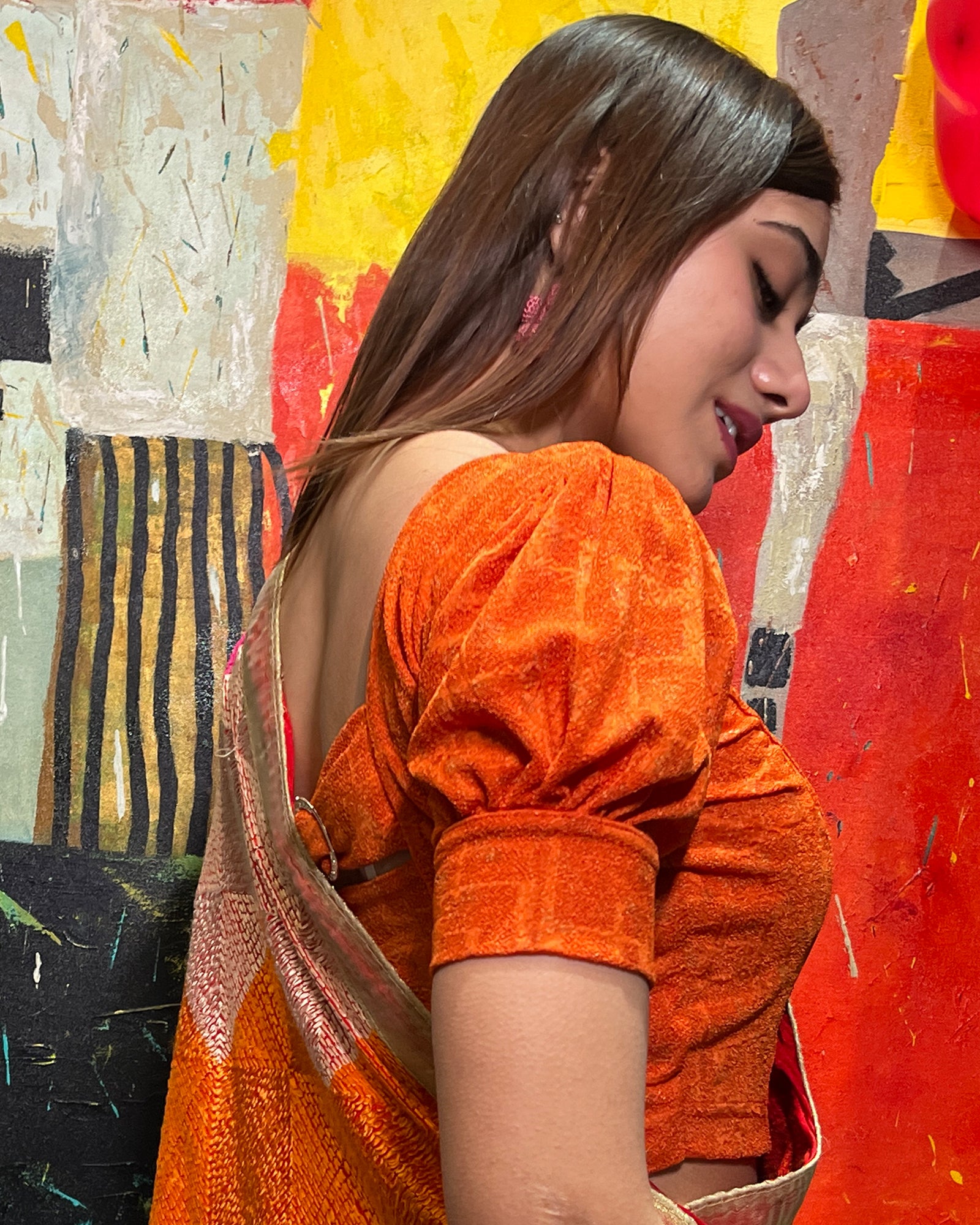 Model pairing the blouse with a saree for a refined festive look