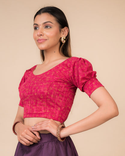 Side profile highlighting the fit, sleeve length, and back buckle feature