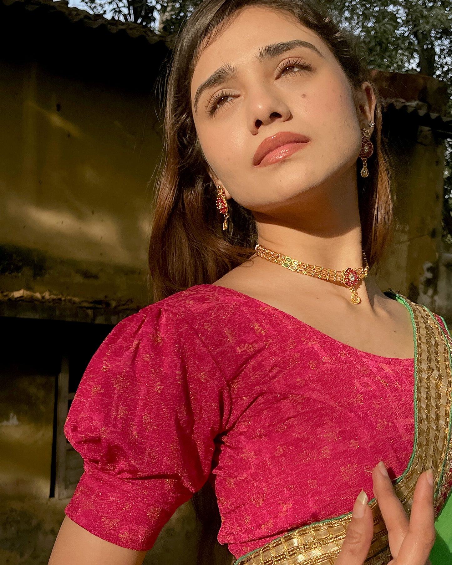 Model pairing the blouse with a saree for a refined festive look
