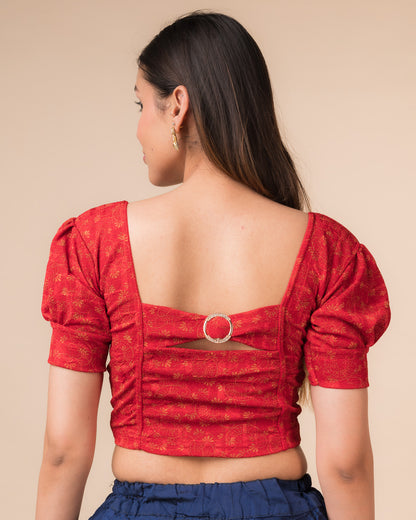 Rear view showcasing the buckle detail and peekaboo square back neckline