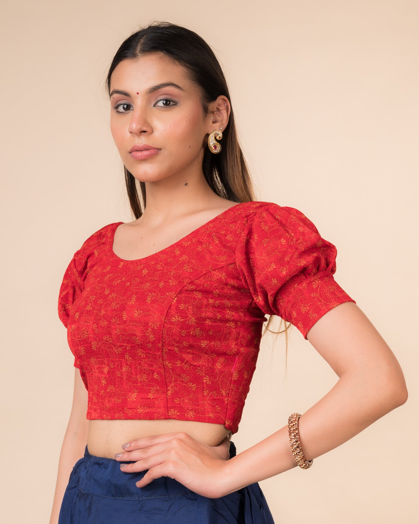 Side profile highlighting the fit, sleeve length, and back buckle feature