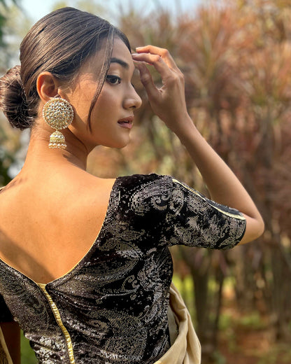 Model pairing the blouse with a festive saree for an elegant ethnic look