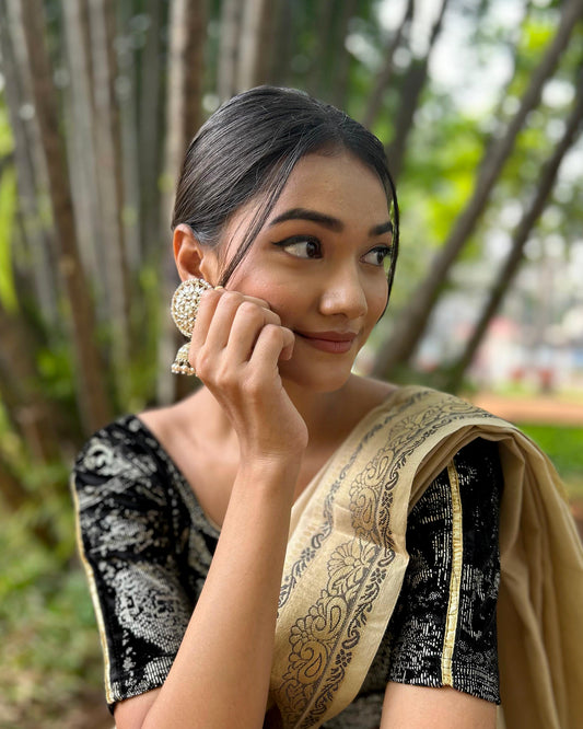 Model pairing the blouse with a festive saree for an elegant ethnic look