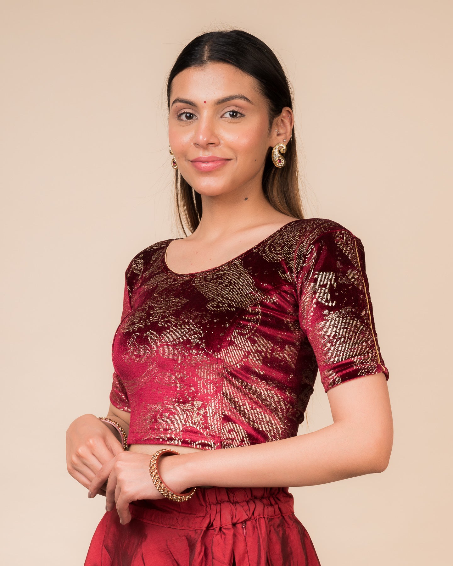 Side profile highlighting the fit, sleeve length, and velvet drape