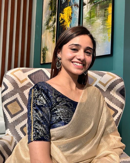 Model pairing the blouse with a festive saree for an elegant ethnic look