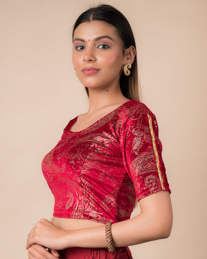 Side profile highlighting the fit, sleeve length, and velvet drape
