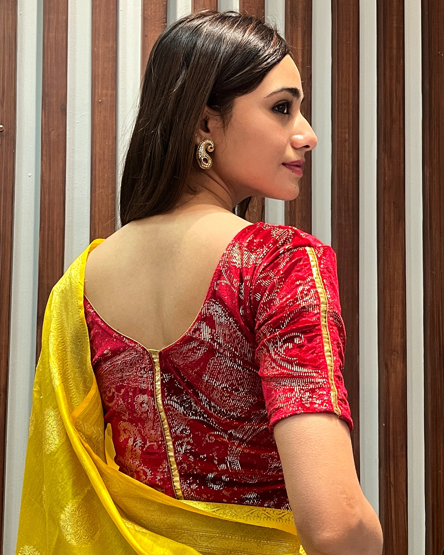 Model pairing the blouse with a festive saree for an elegant ethnic look