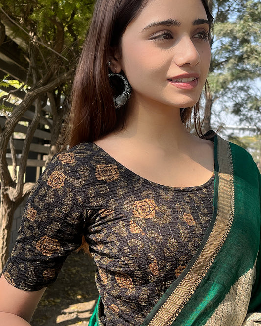 Model pairing the blouse with a saree for festive occasions