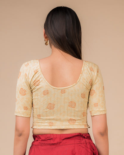 Rear view showcasing the blouse’s slip-on design and back texture