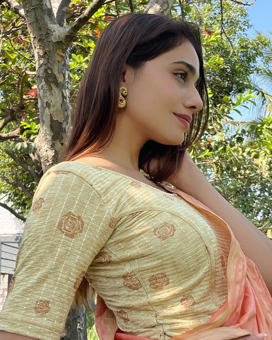 Model pairing the blouse with a saree for festive occasions
