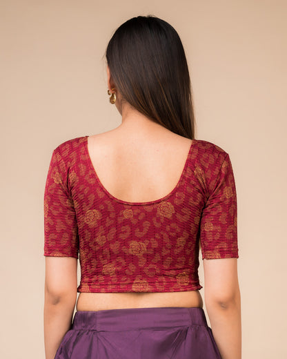 Rear view showcasing the blouse’s slip-on design and back texture