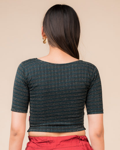 Rear view showcasing the back design of the metallic stripe blouse