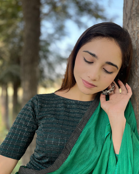 Model pairing the blouse with a saree for a complete ethnic look