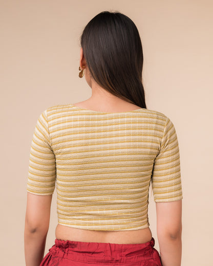 Rear view showcasing the back design of the metallic stripe blouse