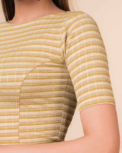 Close-up of the jacquard fabric detailing the gold and silver stripes