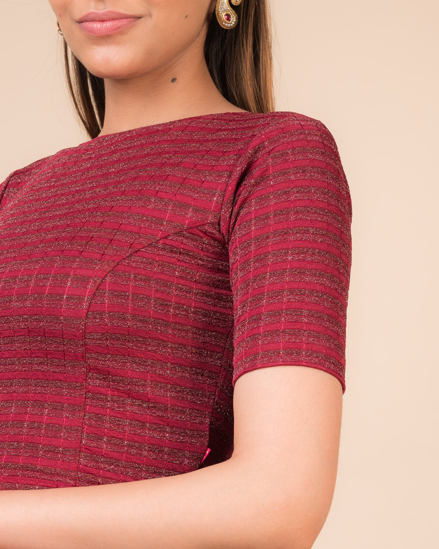 Close-up of the jacquard fabric detailing the gold and silver stripes