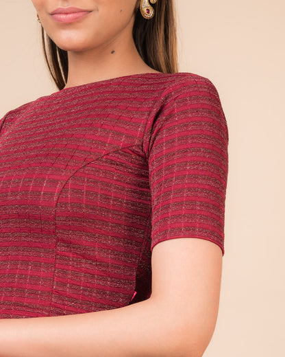 Close-up of the jacquard fabric detailing the gold and silver stripes