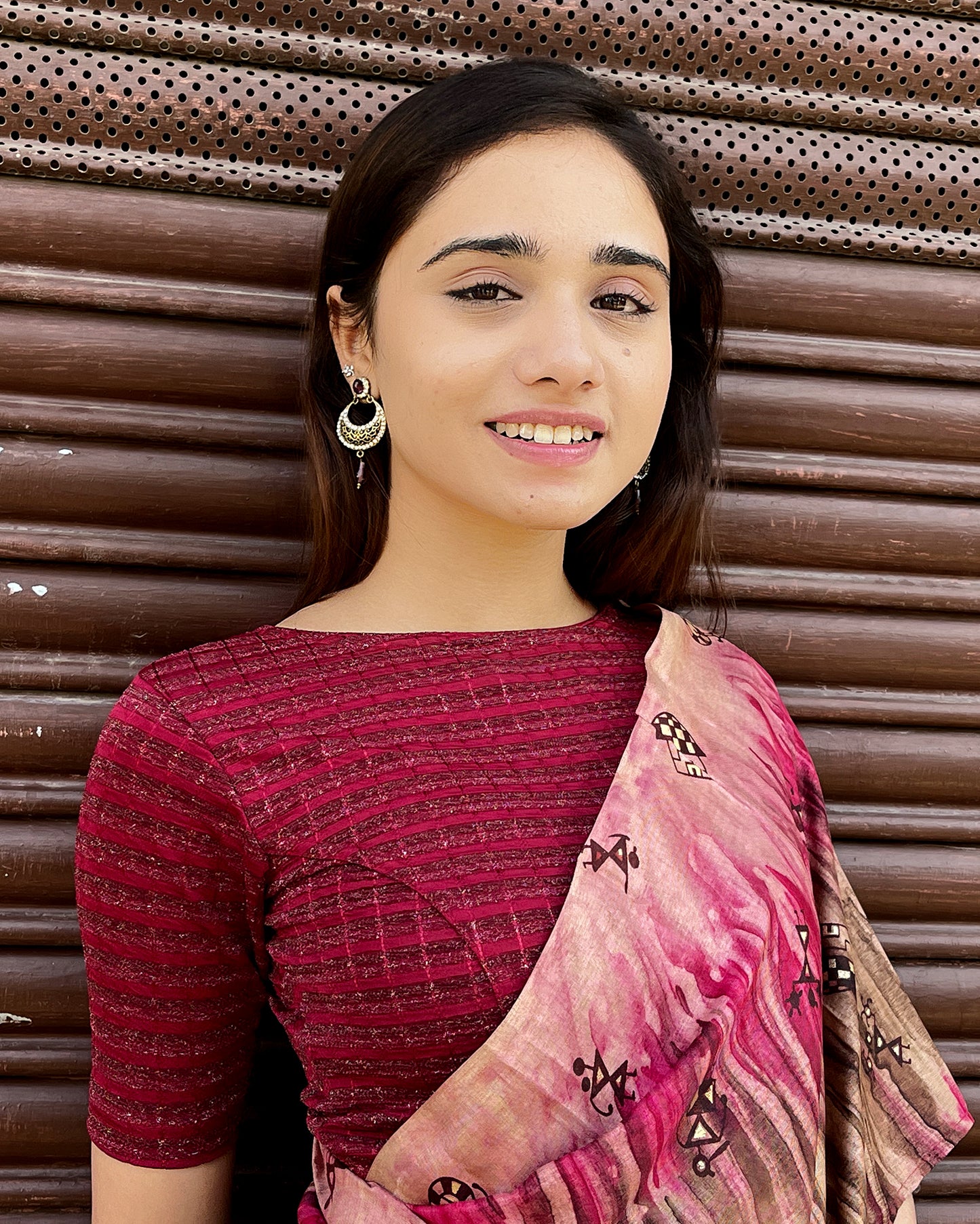 Model pairing the blouse with a saree for a complete ethnic look