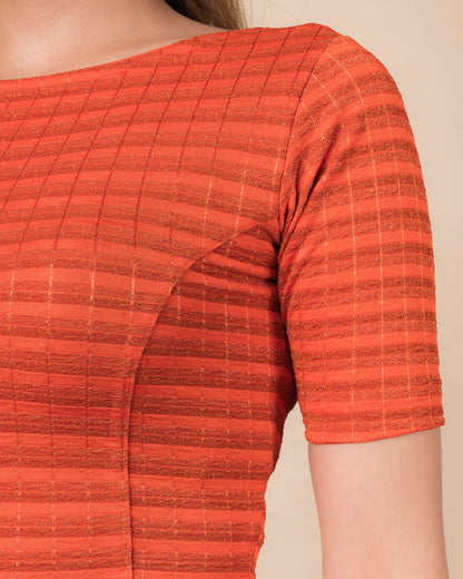 Close-up of the jacquard fabric detailing the gold and silver stripes