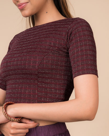 Close-up of the jacquard fabric detailing the gold and silver stripes
