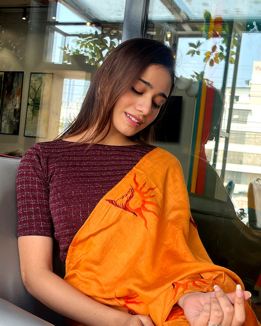 Model pairing the blouse with a saree for a complete ethnic look
