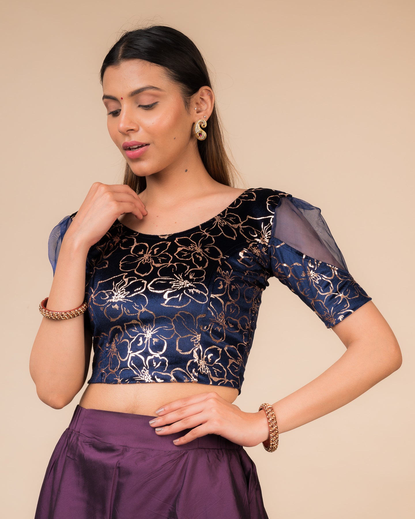 Side profile highlighting the puff sleeves and fit