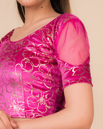 Close-up of velvet texture with floral embroidery and sequin detailing