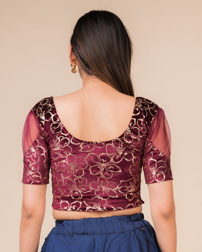 Rear view showcasing the back design and velvet drape