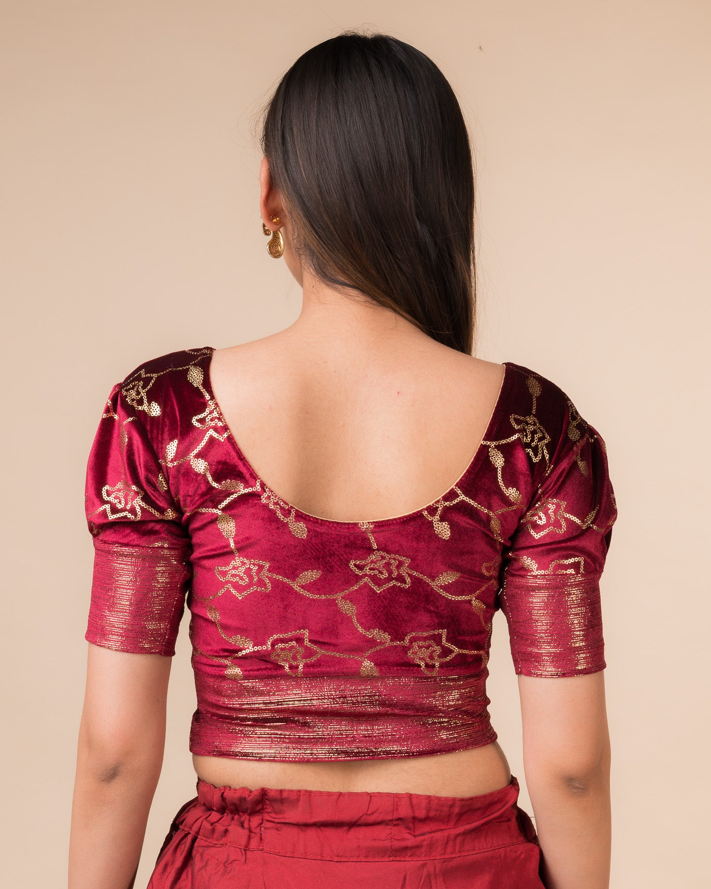 Rear view showcasing the puff sleeves and back silhouette