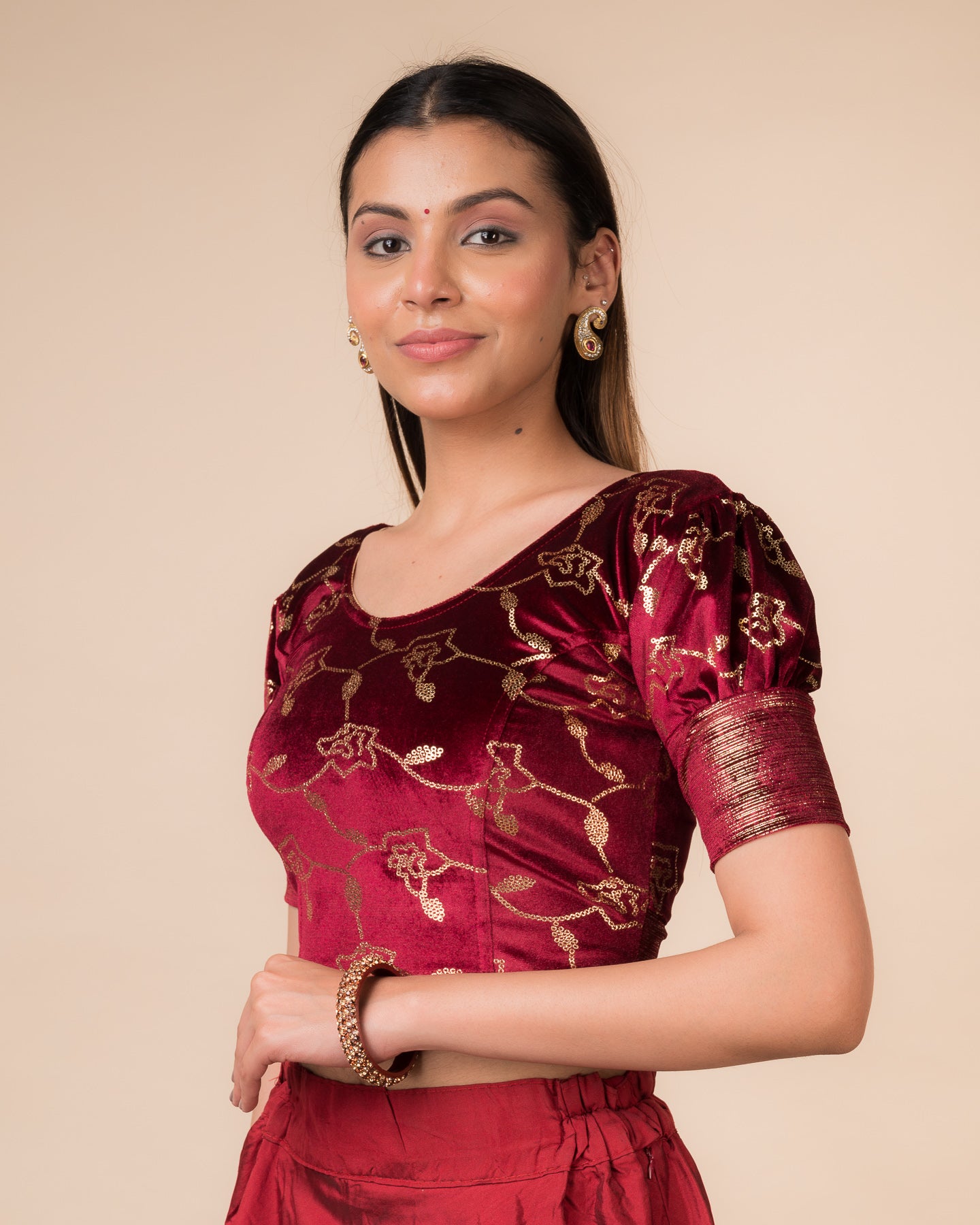 Side profile highlighting the puffed sleeves and fit