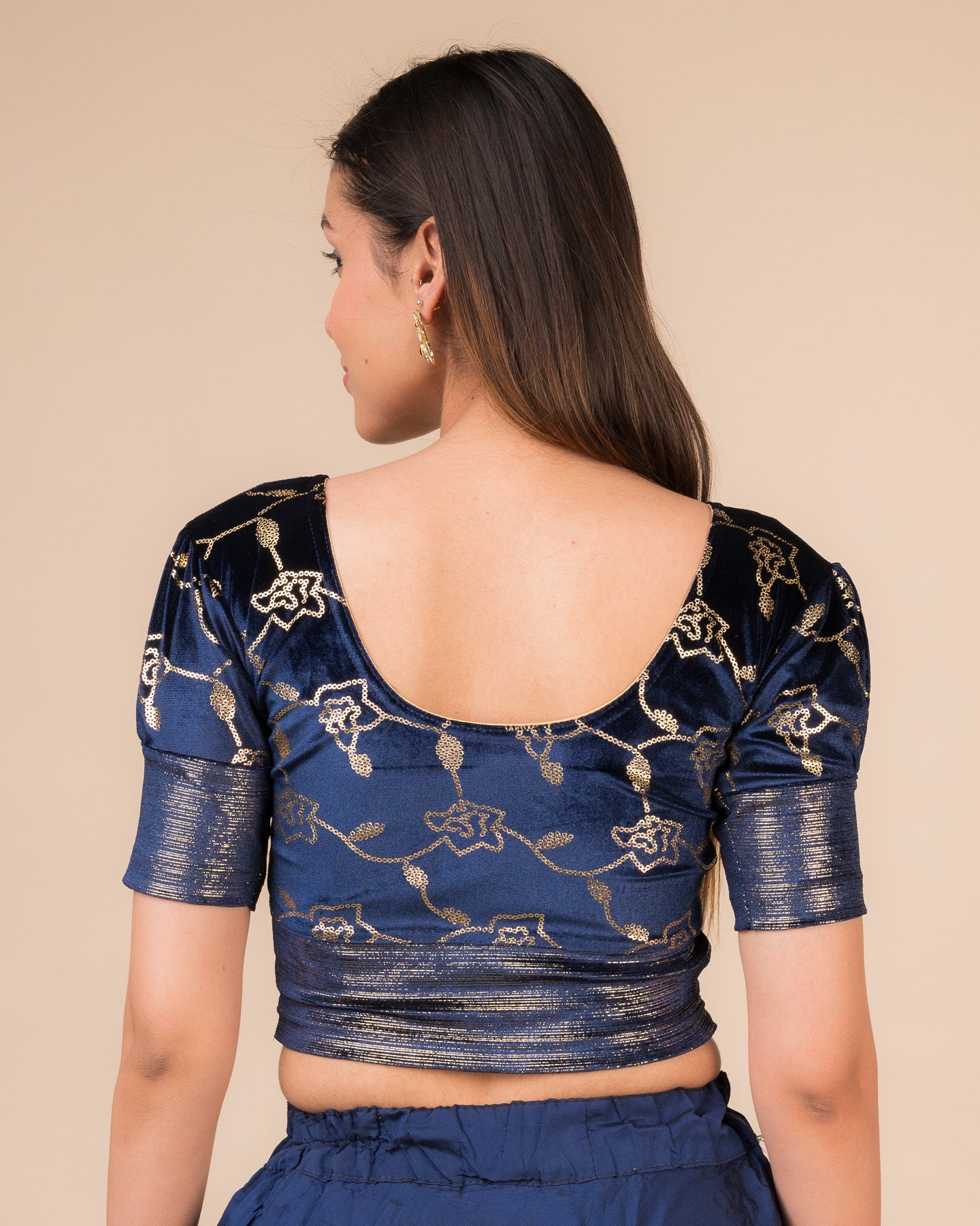 Rear view showcasing the puff sleeves and back silhouette
