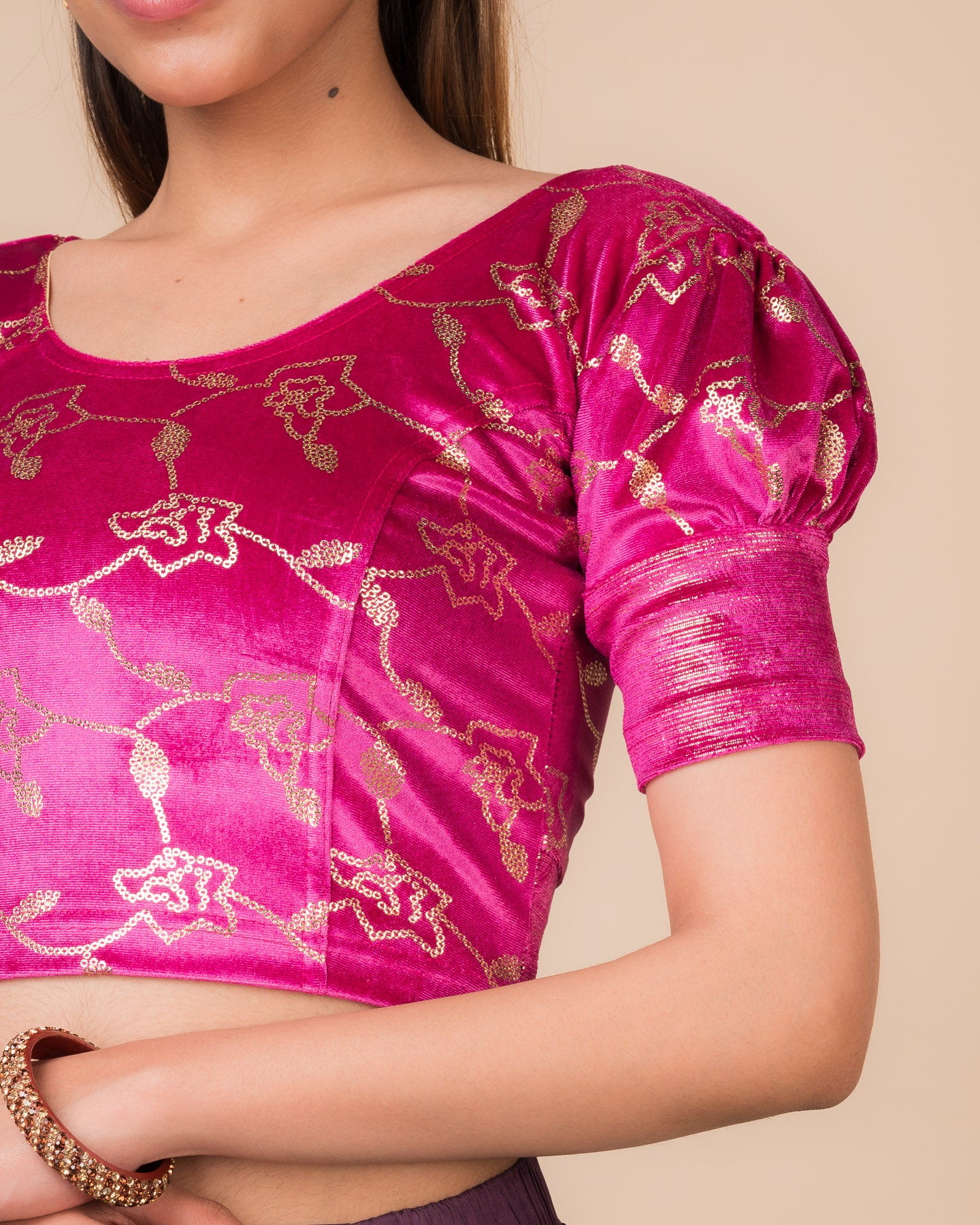 Close-up of the velvet with sequin foil detailing