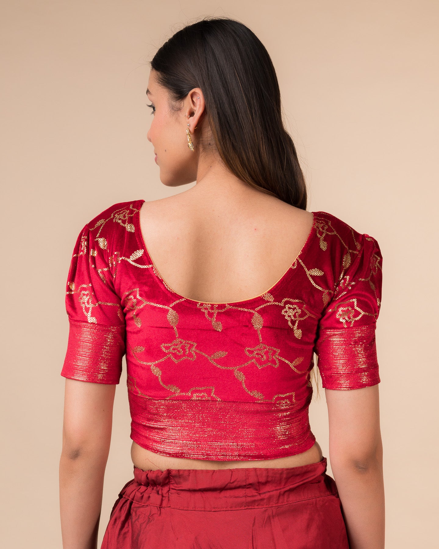 Rear view showcasing the puff sleeves and back silhouette