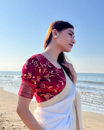 Model pairing the blouse with a festive saree for party occasions