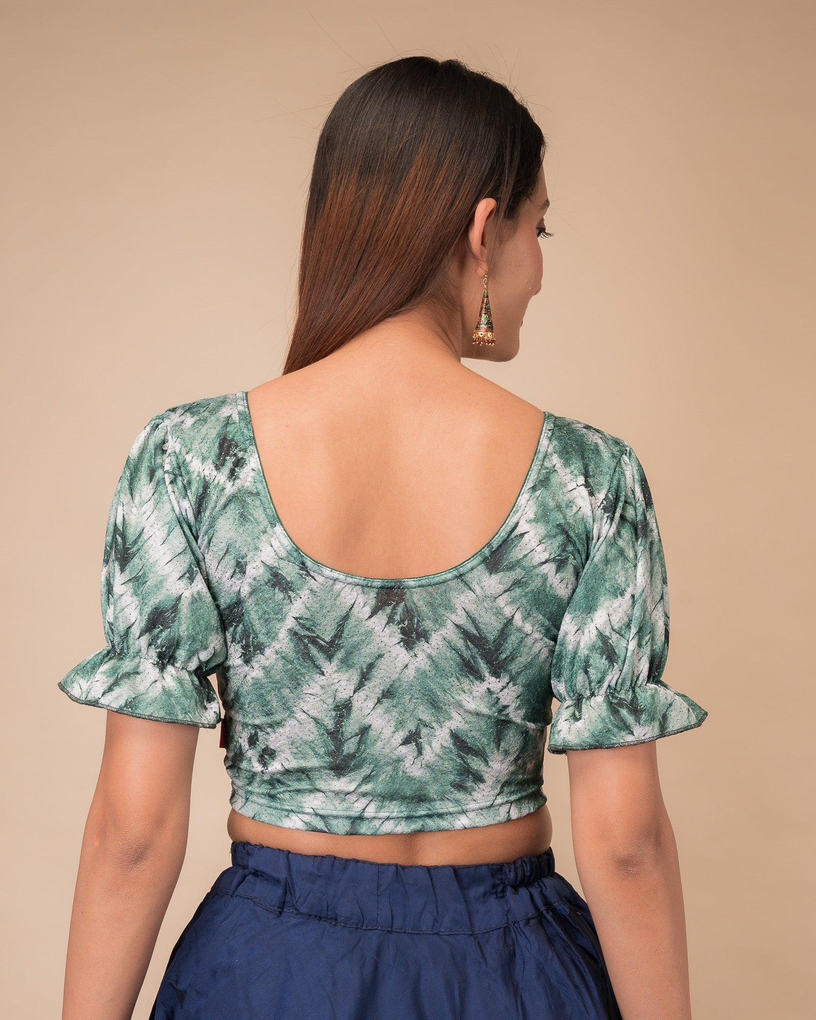 Rear view showcasing the slip-on back design and tie-dye pattern