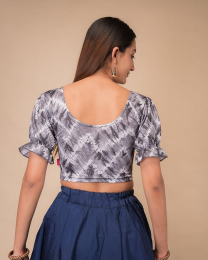 Rear view showcasing the slip-on back design and tie-dye pattern