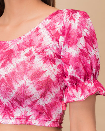 Close-up of the shibori tie-dye fabric with subtle glitter and knitted texture