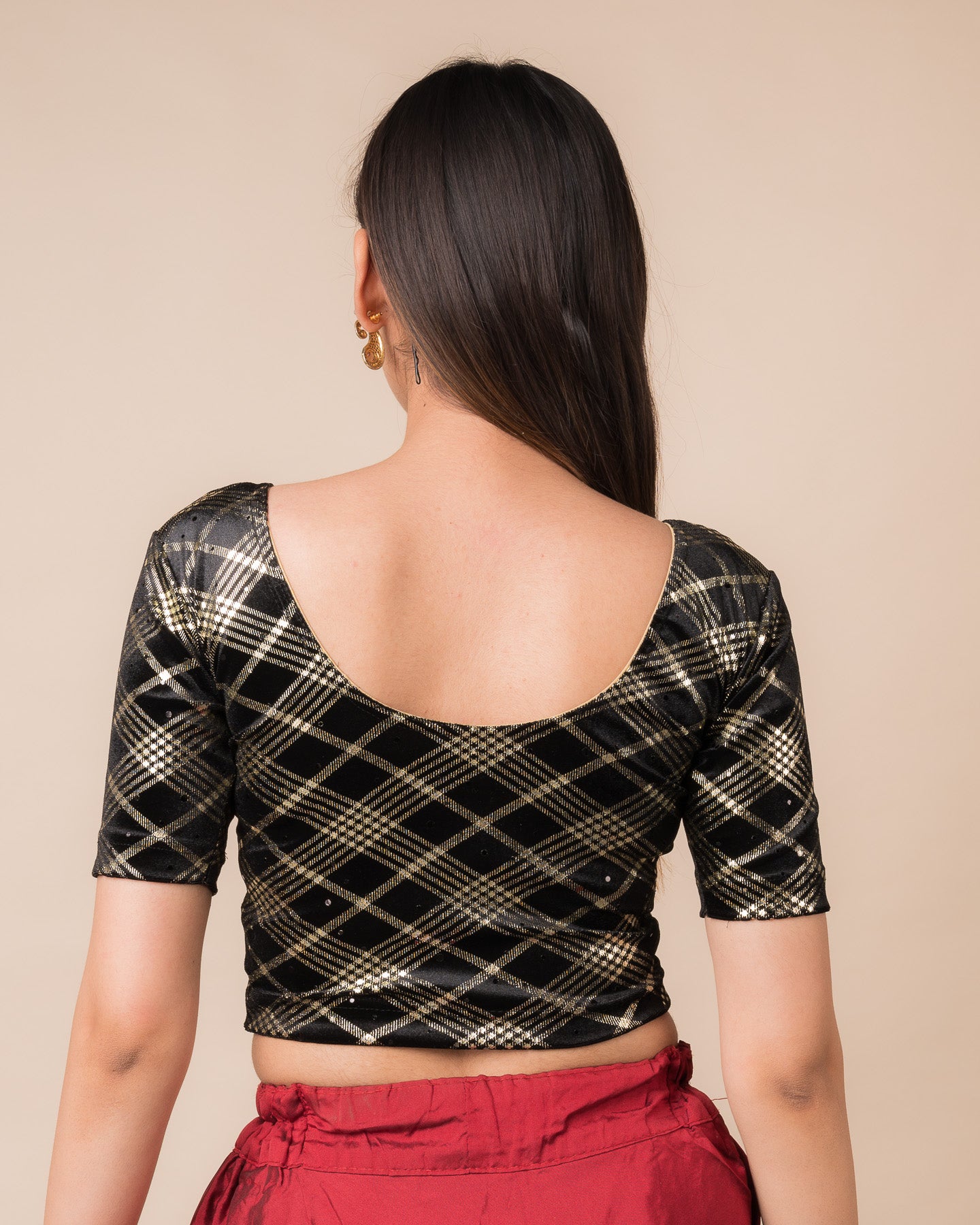 Rear view showcasing the check motif and back design