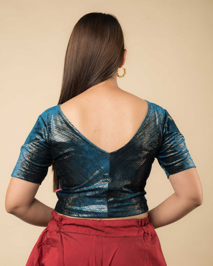  Rear view showcasing the back silhouette and velvet drape