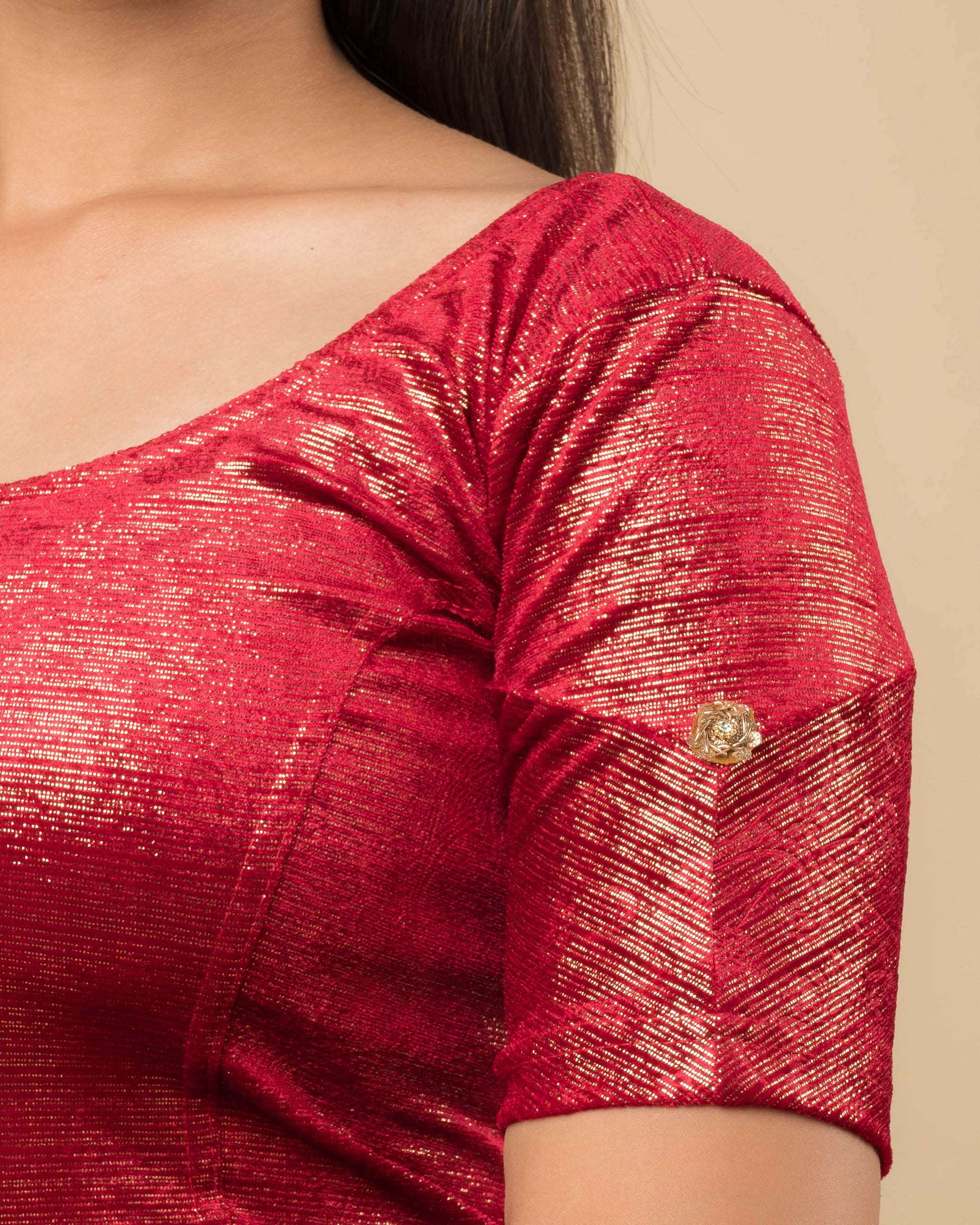Close-up of the jacquard knit with double metallic print.