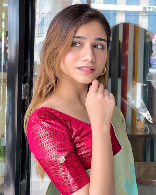 Model pairing the blouse with a saree for a refined festive look